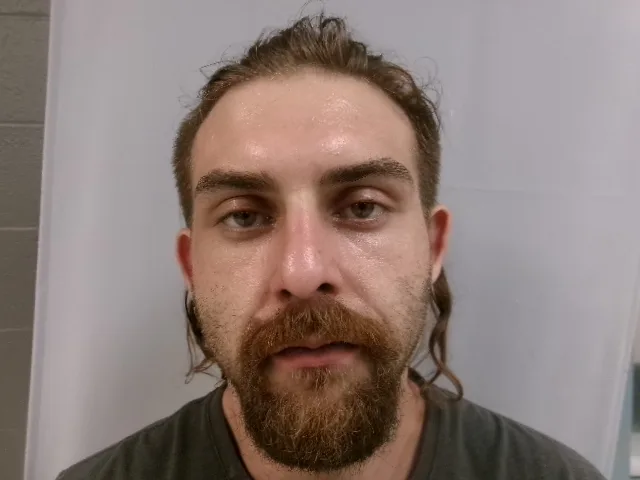 Alleged accomplice in fleeing case charged again